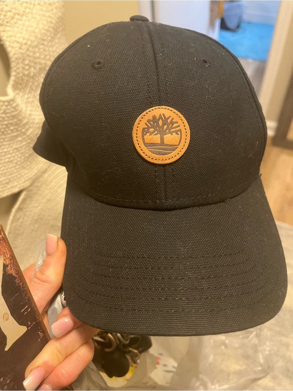 Black Baseball Cap with Tan Leather Strap and Brass Tree Emblem